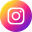 O ícone do aplicativo instagram é formado pelo contorno branco de uma câmera do tipo polaroid e colorida com uma transição de cores de azul, roxo, rosa, laranja, amarelo.